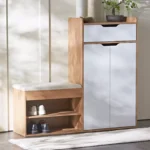 Nesto Oturmalı Ayakkabılık, modern tasarımı ve fonksiyonel yapısıyla antre ve giriş alanlarında düzenli bir görünüm sunar. Oturma banklı yapısı sayesinde ayakkabı giyip çıkarırken konfor sağlar, kapaklı dolap bölümü ile ayakkabılarınızı tozdan ve dağınıklıktan korur. Doğal ahşap dokusu ve sade beyaz kapak tasarımı, hem modern hem de sıcak bir dekorasyon uyumu oluşturur. Oturmalı ayakkabılık dolabı, sınırlı alanlarda bile maksimum depolama alanı sunarak ev girişlerinde pratik bir çözüm sağlar. Sağlam gövde yapısı, uzun ömürlü kullanım sunarken; antre, koridor ve vestiyer alanları için ideal bir mobilya tercihi olarak öne çıkar. Şıklık ve kullanım kolaylığını bir arada sunan Nesto ayakkabılık, evinizin giriş alanını tamamlayan fonksiyonel bir üründür.