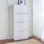 Liva Tall Modern Ayakkabılık, yüksek ve çok bölmeli yapısıyla ayakkabı düzenini maksimum seviyeye taşıyan fonksiyonel bir depolama çözümüdür. Dikey tasarımı sayesinde dar antrelerde yer tasarrufu sağlarken, geniş iç hacmi ile çok sayıda ayakkabıyı düzenli şekilde muhafaza etmeye olanak tanır. Modern ve sade çizgilere sahip Liva Tall, kapaklı ayakkabılık sistemiyle ayakkabıları tozdan ve dağınıklıktan korur. Minimal kulp detayları ve zamansız beyaz rengi sayesinde modern ev dekorasyonlarıyla mükemmel uyum sağlar. Yüksek ayakkabılık formu, özellikle kalabalık aileler ve fazla ayakkabı kapasitesine ihtiyaç duyan kullanıcılar için ideal bir çözümdür. Dayanıklı malzeme yapısı ve kaliteli işçiliğiyle uzun ömürlü kullanım sunan Liva Tall ayakkabılık, antre, hol ve giriş alanlarında hem düzen hem de estetik bir görünüm oluşturur.